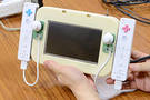 Wii U : le prototype du GamePad, deux Wiimotes scotches  une tablette